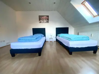 Ein Bett oder Betten in einem Zimmer der Unterkunft Komfortables Apartment