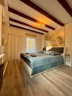Ein Bett oder Betten in einem Zimmer der Unterkunft Ferienhaus Veronika Odenwald