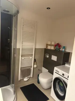 Ein Badezimmer in der Unterkunft Moderne ruhige Ferienwohnung