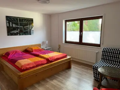 Ein Bett oder Betten in einem Zimmer der Unterkunft Wohnung in Feldrandlage