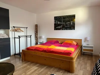 Ein Bett oder Betten in einem Zimmer der Unterkunft Wohnung in Feldrandlage