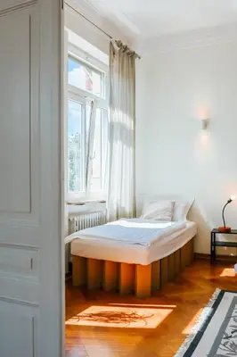 Ein Bett oder Betten in einem Zimmer der Unterkunft namastay! Exklusiver Altbau in Bestlage - 3BR
