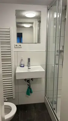 Ein Badezimmer in der Unterkunft Sahra 1Zi. Wohnung Arheiligen