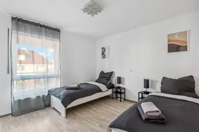 Ein Bett oder Betten in einem Zimmer der Unterkunft Galeriewohnung im Zentrum Worms!