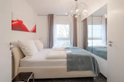 Ein Bett oder Betten in einem Zimmer der Unterkunft Wohnung mit Dachterrasse