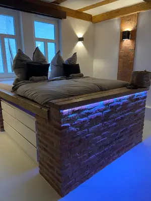 Ein Bett oder Betten in einem Zimmer der Unterkunft Casa Linda, luxuriöse Ferienwohnung im Grünen