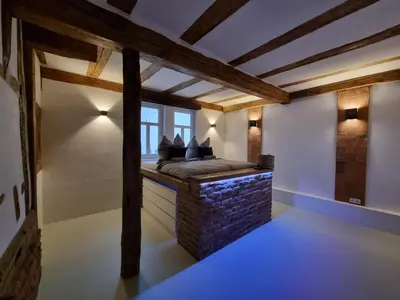 Ein Bett oder Betten in einem Zimmer der Unterkunft Casa Linda, luxuriöse Ferienwohnung im Grünen