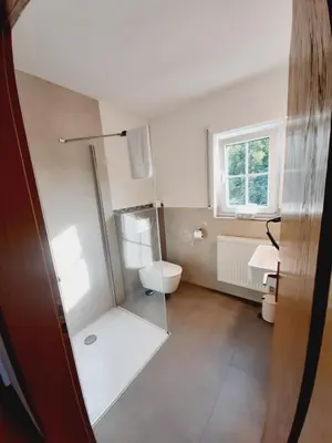 Ein Badezimmer in der Unterkunft Pension Dorfengel