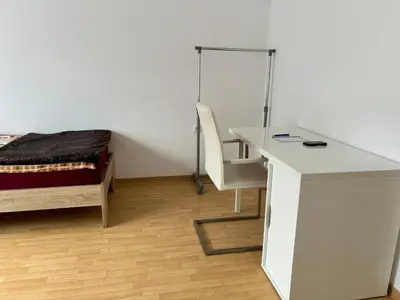 Ein Bett oder Betten in einem Zimmer der Unterkunft Ferienwohnung Grimm