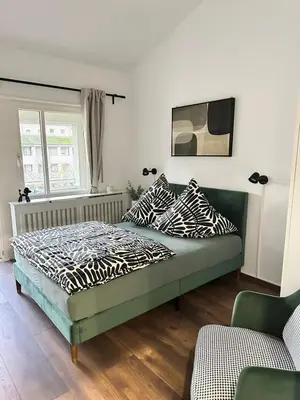 Ein Bett oder Betten in einem Zimmer der Unterkunft Waldstadt Urban nähe KIT
