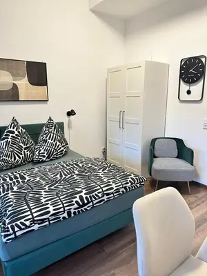 Ein Bett oder Betten in einem Zimmer der Unterkunft Waldstadt Urban nähe KIT