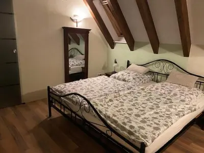 Ein Bett oder Betten in einem Zimmer der Unterkunft Fachwerkhaus mit Sauna & Kamin in St Martin