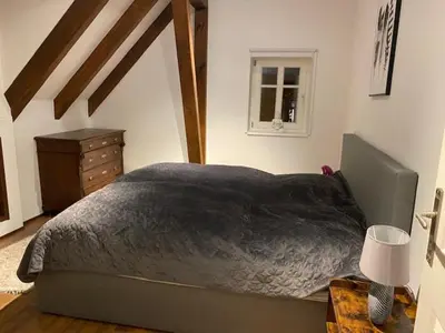 Ein Bett oder Betten in einem Zimmer der Unterkunft Fachwerkhaus mit Sauna & Kamin in St Martin