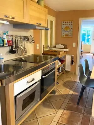 Küche/Küchenzeile in der Unterkunft Gemütliche Hof Wohnung in St Martin mit Sauna