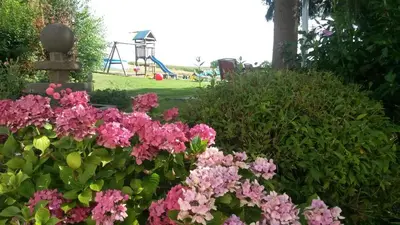 Ein Garten an der Unterkunft Ferienwohnungen Eichenhof