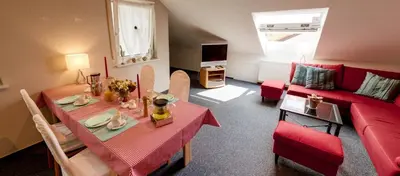 Ein Sitzbereich in der Unterkunft Ferienwohnungen Eichenhof