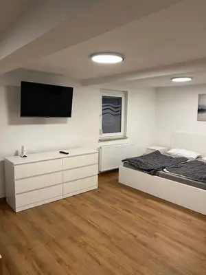 Ein Bett oder Betten in einem Zimmer der Unterkunft Home for You- Monteurwohnung Ferienwohnung 2