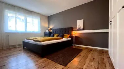 Ein Bett oder Betten in einem Zimmer der Unterkunft Gemütlicher Bungalow in Stadtnähe