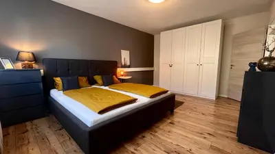 Ein Bett oder Betten in einem Zimmer der Unterkunft Gemütlicher Bungalow in Stadtnähe