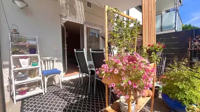 Ein Garten an der Unterkunft Gemütlicher Bungalow in Stadtnähe
