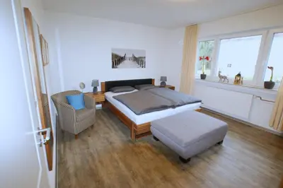 Ein Bett oder Betten in einem Zimmer der Unterkunft Ferienhaus Landhaus Klein