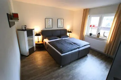 Ein Bett oder Betten in einem Zimmer der Unterkunft Ferienhaus Landhaus Klein
