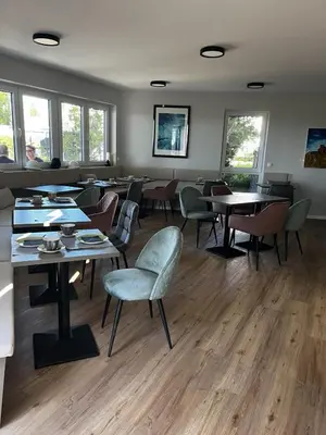 Ein Sitzbereich in der Unterkunft Amelie No 3 Hotel & Appartements