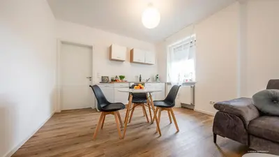 Ein Sitzbereich in der Unterkunft WineDesign Boxspring 8 Pers BASF Nähe Ludwigshafen und Mannheim