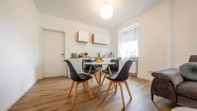 Ein Sitzbereich in der Unterkunft WineDesign Boxspring 8 Pers BASF Nähe Ludwigshafen und Mannheim