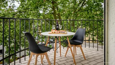 Ein Balkon oder eine Terrasse in der Unterkunft WineDesign Boxspring 8 Pers BASF Nähe Ludwigshafen und Mannheim