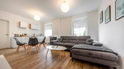 Ein Sitzbereich in der Unterkunft WineDesign Boxspring 8 Pers BASF Nähe Ludwigshafen und Mannheim