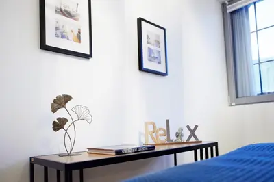 Ein Bett oder Betten in einem Zimmer der Unterkunft Neu! UPPER ROOM Industrial Loft Domizil mit Dachterrasse & Ausblick