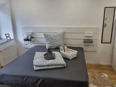 Ein Bett oder Betten in einem Zimmer der Unterkunft City Central Apartment House