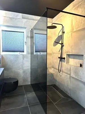 Ein Badezimmer in der Unterkunft Ferienwohnung am Schwimmbad