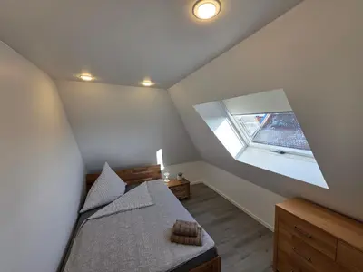 Ein Bett oder Betten in einem Zimmer der Unterkunft Handwerkerwohnung, Monteurunterkunft-Rodgau