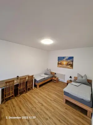 Ein Bett oder Betten in einem Zimmer der Unterkunft Handwerkerwohnung, Monteurunterkunft-Rodgau