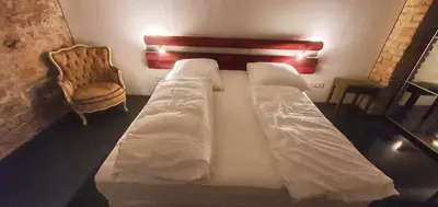 Ein Bett oder Betten in einem Zimmer der Unterkunft 1-Zimmer-Wohnung im Loft