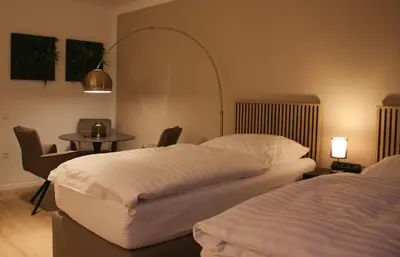 Ein Bett oder Betten in einem Zimmer der Unterkunft Modern & Comfortable Business Apartment Stuttgart - WLAN, 4K TV, Küche, Waschmaschine, Balkon