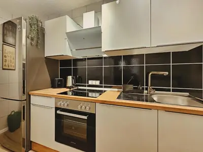 Küche/Küchenzeile in der Unterkunft Modern & Comfortable Business Apartment Stuttgart - WLAN, 4K TV, Küche, Waschmaschine, Balkon