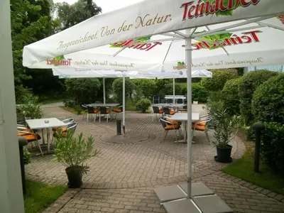 Ein Garten an der Unterkunft Sportpark Jürgen Fassbender