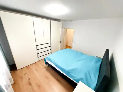 Ein Bett oder Betten in einem Zimmer der Unterkunft Haus am See