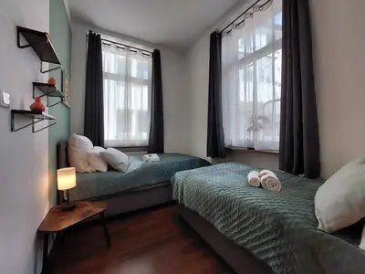 Ein Bett oder Betten in einem Zimmer der Unterkunft Zigarrenhof Apartment in Citynähe inkl. Netflix