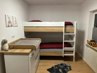 Ein Bett oder Betten in einem Zimmer der Unterkunft Ferienwohnung Schubert owwe