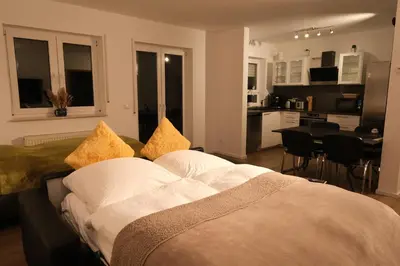 Ein Bett oder Betten in einem Zimmer der Unterkunft Apartment 4