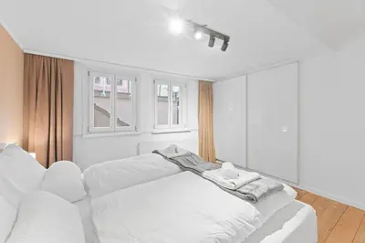Ein Bett oder Betten in einem Zimmer der Unterkunft TOP Apartments - Moderne Altbauwohnung im Zentrum Ludwigsburg - Kingsize Bett - Netflix - 80qm - 24h Check-In