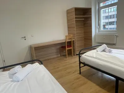 Ein Bett oder Betten in einem Zimmer der Unterkunft Timeless: 4 Zimmer Apartment Ludwigsburg