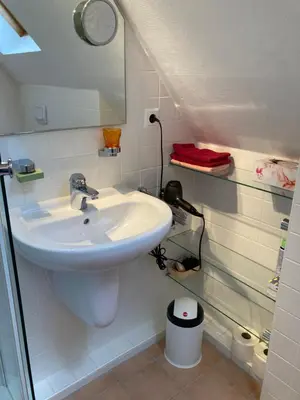 Ein Badezimmer in der Unterkunft Terrassenwohnung