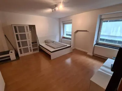 Ein Bett oder Betten in einem Zimmer der Unterkunft City Central Apartment