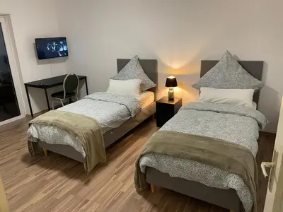 Ein Bett oder Betten in einem Zimmer der Unterkunft Schöne Wohnung in Mannheim