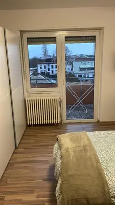 Ein Bett oder Betten in einem Zimmer der Unterkunft Schöne Wohnung in Mannheim